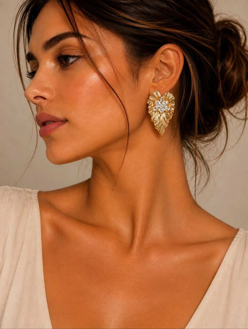 Stainless steel gold tone leaf crystal earrings